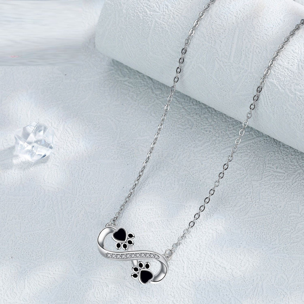 Collar Infinity con huella de pata y zirconias