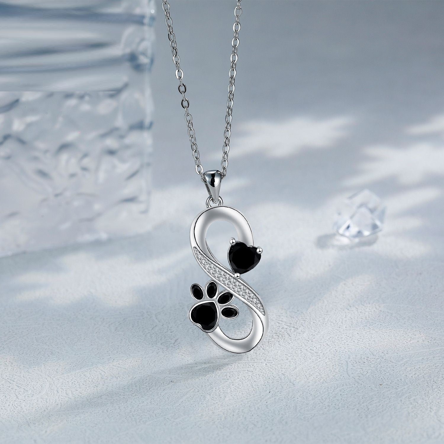 Collar con símbolo de infinito, corazones, huella de pata
