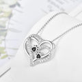 Collar con corazón y huella de perro con circonitas