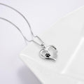 Collar con colgante en forma de pata y corazón con dije de infinito
