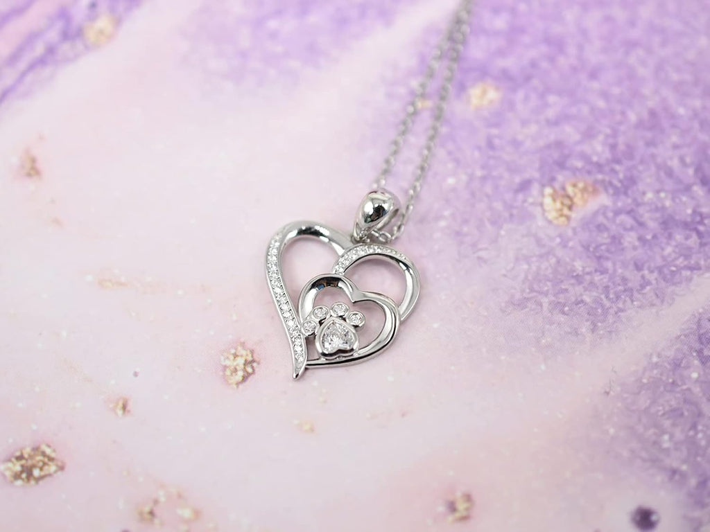 Collar de plata esterlina con huella de pata y corazón con zircones
