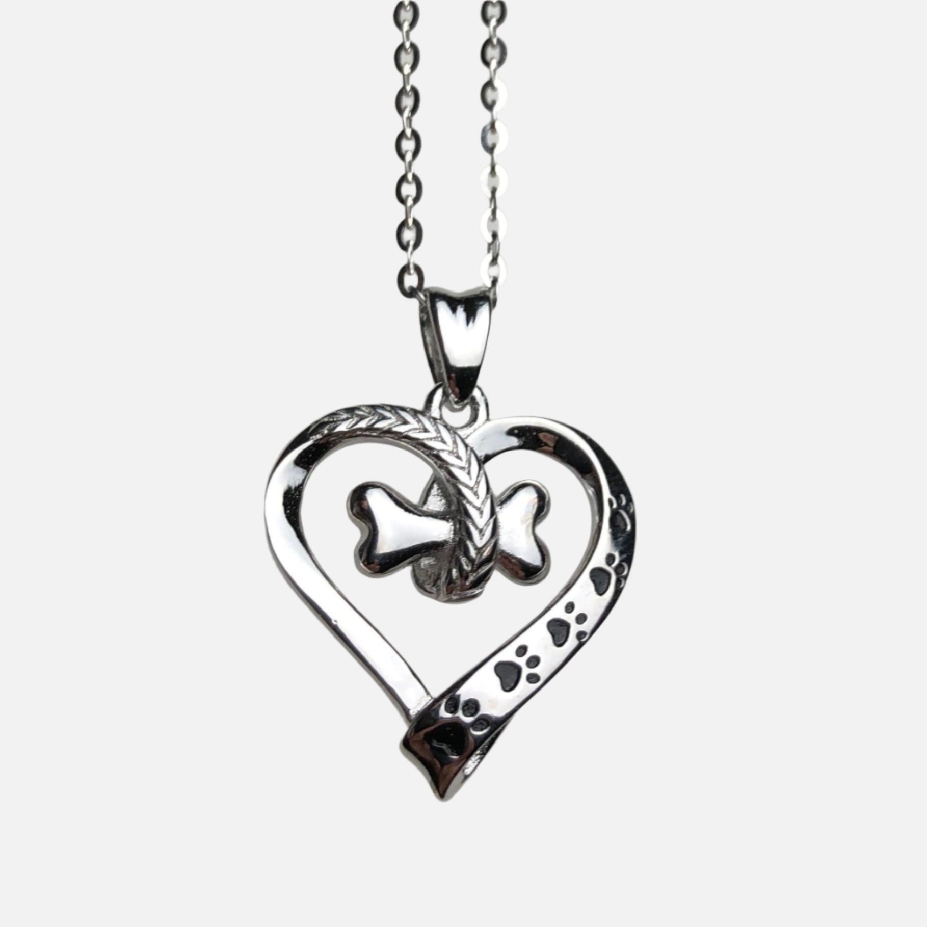 Collar con colgante en forma de pata de perro y corazón de acero inoxidable