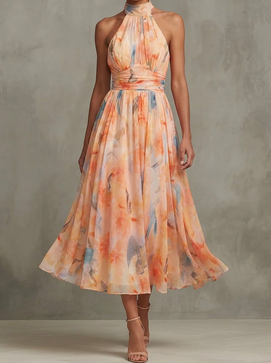 VESTIDO CON CUELLO HALTER Y ESTAMPADO EN ACUARELA