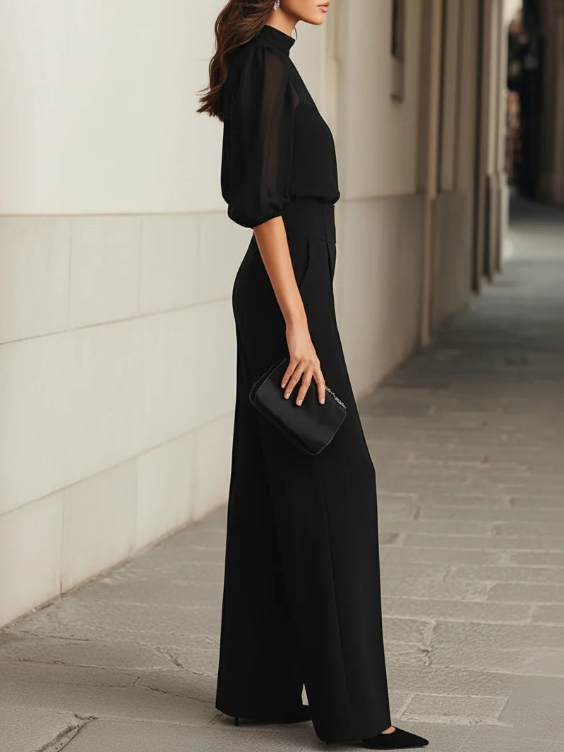 CONJUNTO DE TRES PIEZAS NEGRO, COMPUESTO POR UNA CAMISOLA TRANSPARENTE Y PANTALONES DE PIERNA ANCHA