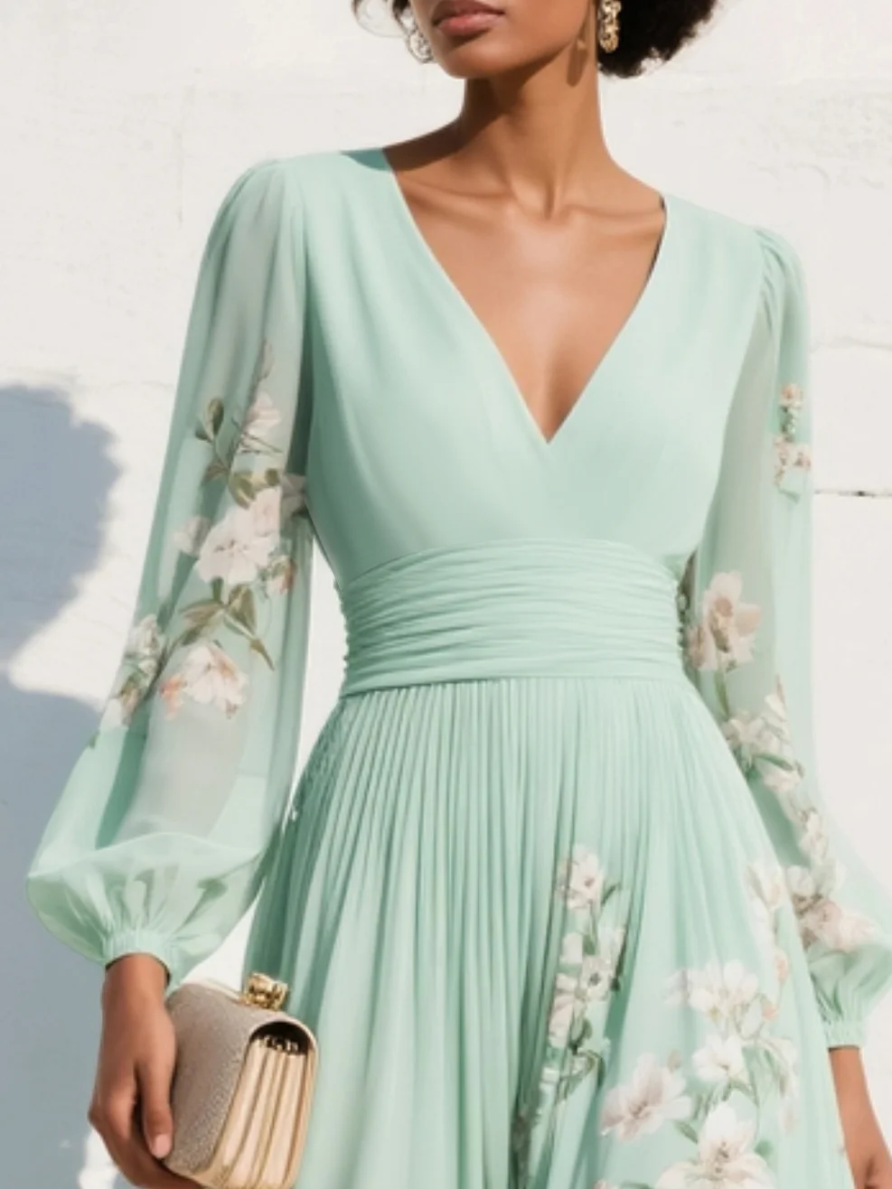 VESTIDO LARGO PLISADO CON ESTAMPADO FLORAL