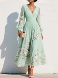 VESTIDO LARGO PLISADO CON ESTAMPADO FLORAL