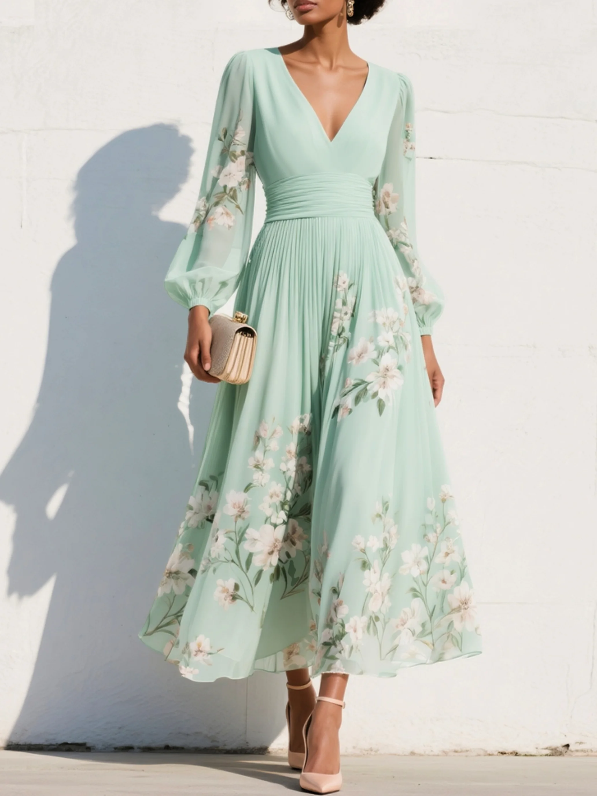 VESTIDO LARGO PLISADO CON ESTAMPADO FLORAL