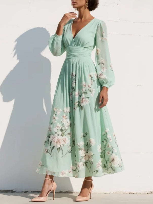 VESTIDO LARGO PLISADO CON ESTAMPADO FLORAL