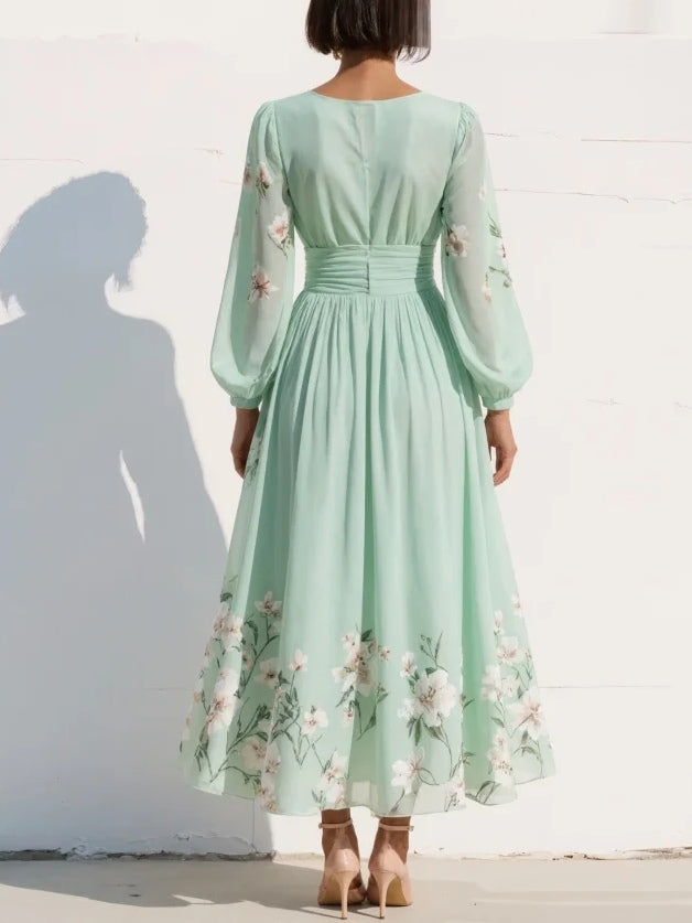 VESTIDO LARGO PLISADO CON ESTAMPADO FLORAL
