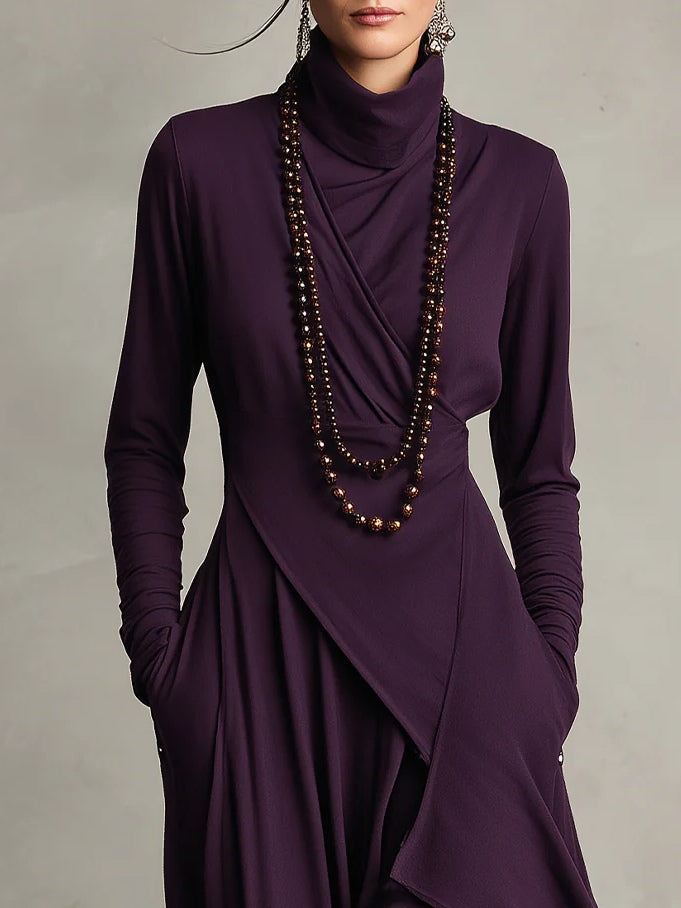 VESTIDO ASIMÉTRICO CON CUELLO ALTO
