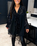 BLUSA CON VOLANTES