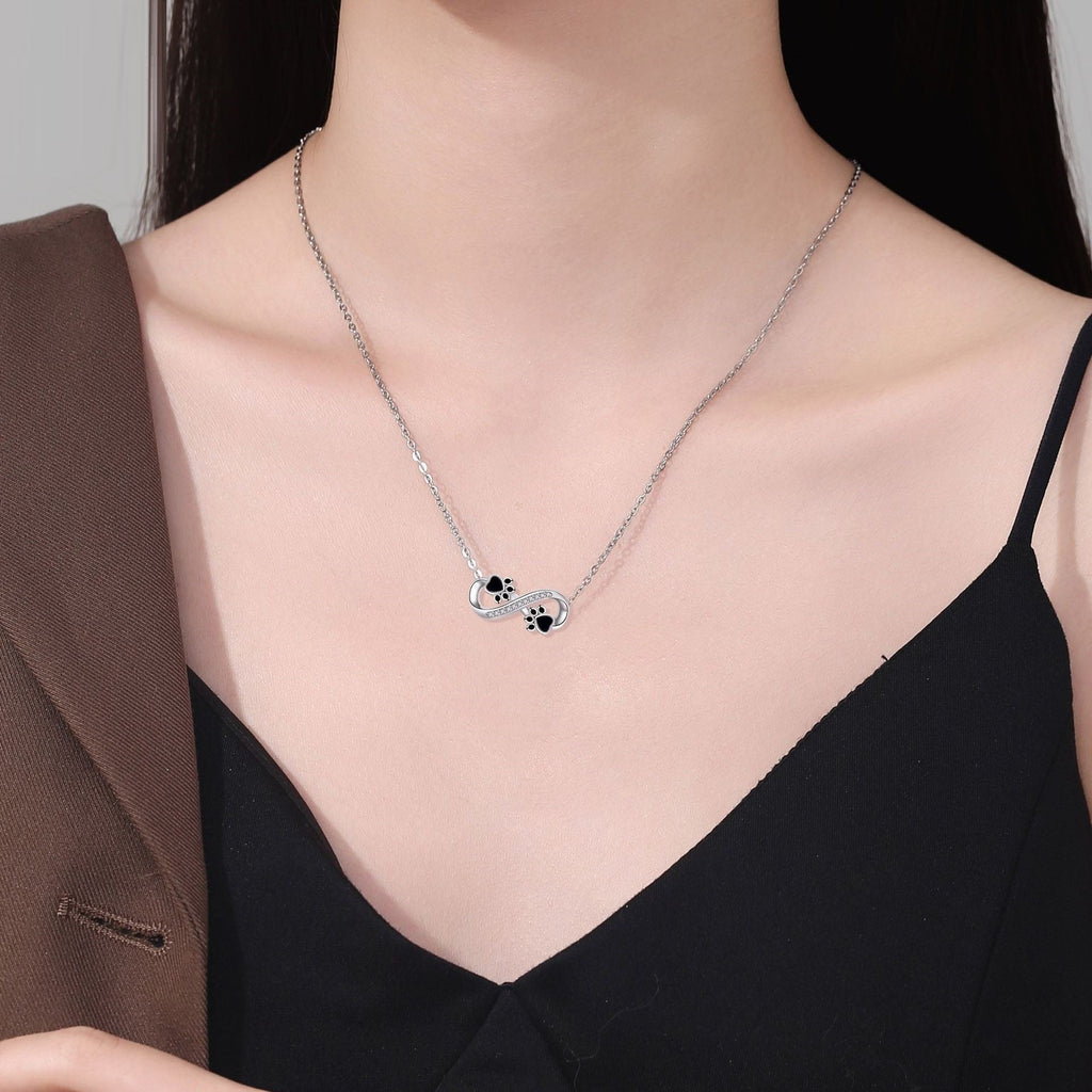 Collar Infinity con huella de pata y zirconias