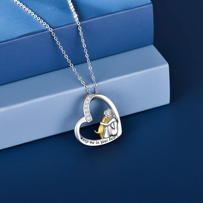 Collar con corazón de plata, con perro y piedras de zirconia