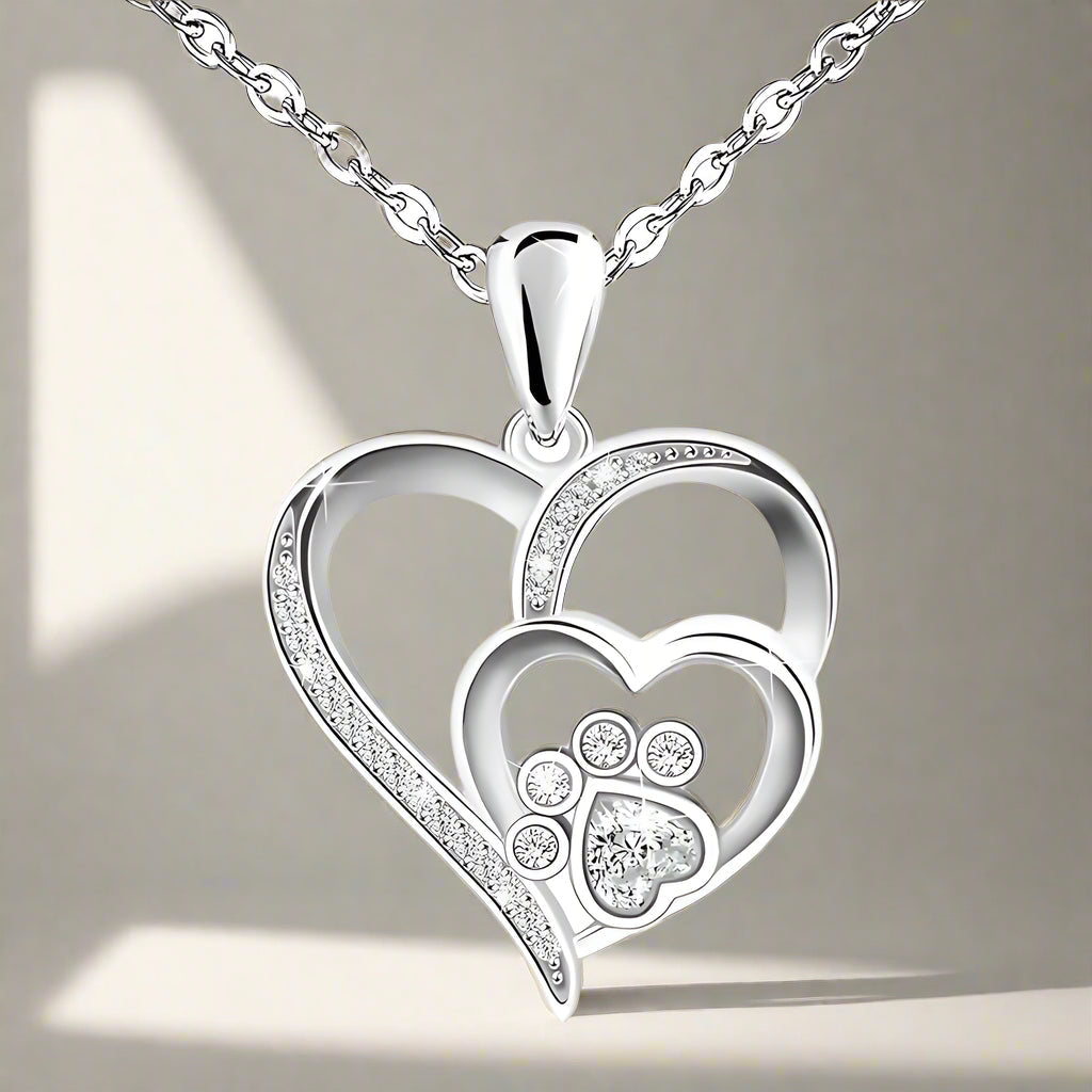 Collar de plata esterlina con huella de pata y corazón con zircones