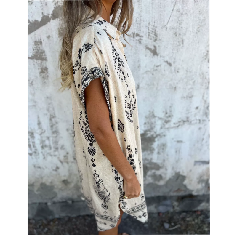 VESTIDO ESTAMPADO CON BOLSILLOS